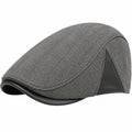 Gorra plana talla única de tejido gris con diseño clásico