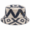 Sombrero pescador talla única de tejido beige y azul marino con estampado geométrico y ojales metálicos
